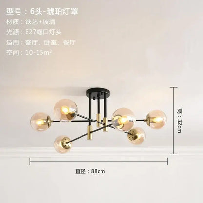 Modern black and gold six-light glass ball led chandelier with black iron and brass accents for living room decorbites glass ball