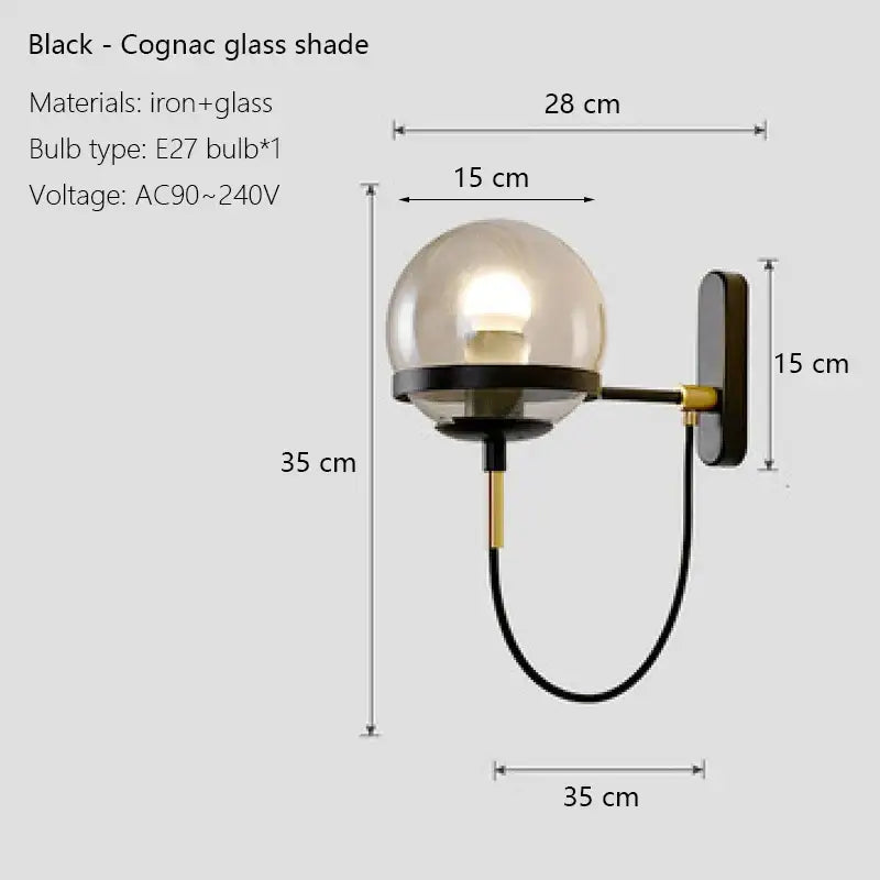 Modern black wall sconce lamp with spherical cognac glass shade and iron frame for bedroom lighting use