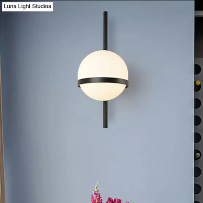 Modern black and gold wall sconce with frosted glass shade and spherical design for bedroom e26 e27 light type