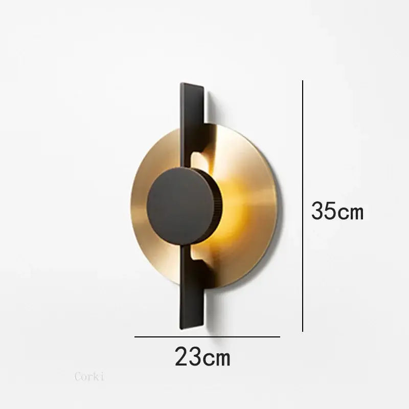 Modern black and gold iron art led wall lamp with circular brass base and black matte accents for dining room decorbites iron art