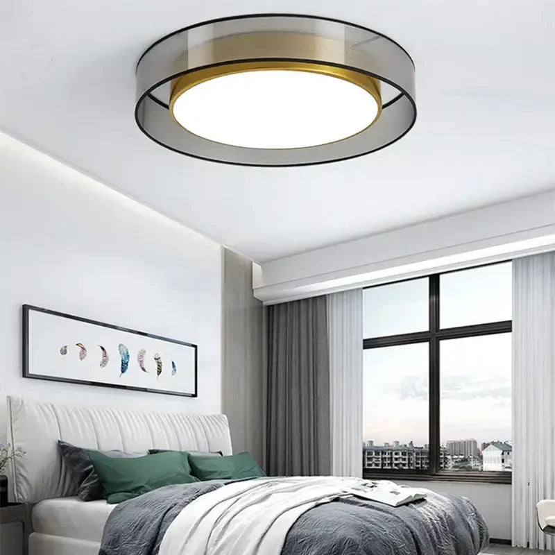 Modern black and gold led ceiling light with frosted glass center and circular design for living room ceiling light use