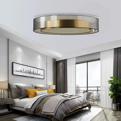 Modern black and gold led ceiling light with sleek metallic finish and circular design for living room use