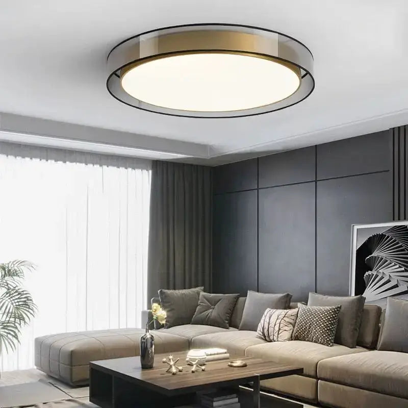 Modern black and gold led ceiling light with circular design and soft white illumination for living room use