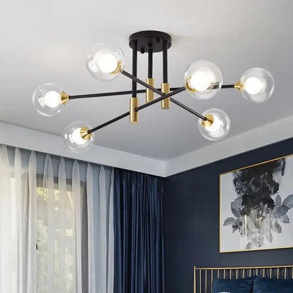 Modern black and gold led chandelier with clear glass globe bulbs for living room decor by decorbites black gold led