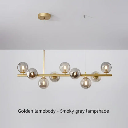 Modern black and gold led pendant chandelier with smoky gray glass globe shades for living room lighting