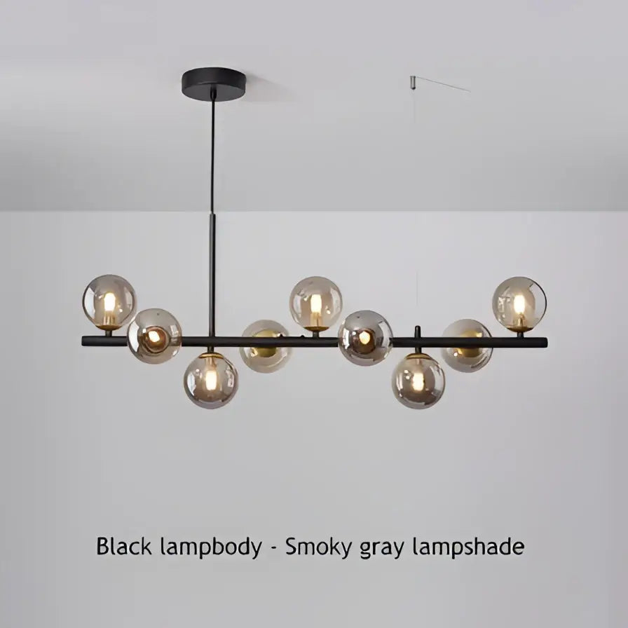 Modern black and gold led pendant chandelier with black led and smoky gray glass globe shades for living room lighting