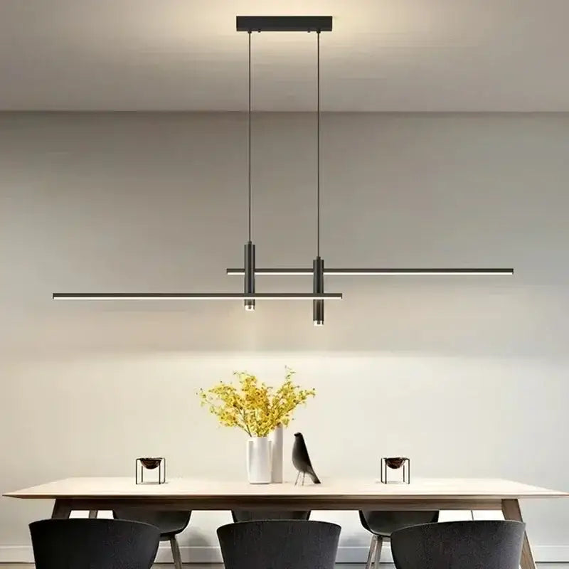 Modern black and gold led pendant light with sleek horizontal bars and thin cords for minimalist dining room design