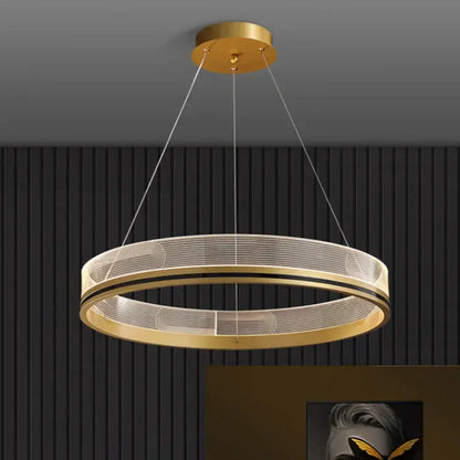 Modern black gold led pendant light with gold-toned circular mesh design and black accent bands for dining room use