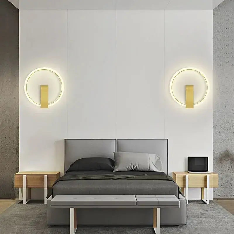 Modern black and gold led wall lamp with gold circular illuminated rings and sleek bars for living room lighting