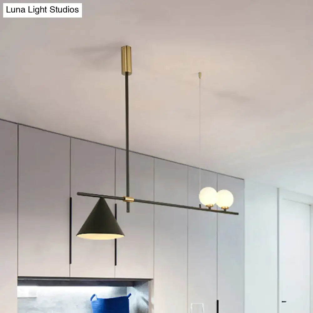 Modern black and gold metal cone island light with matte black shade and frosted glass bulbs for dining room lighting