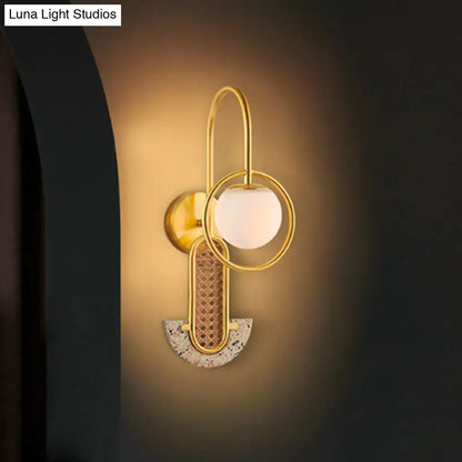 Modern black and gold wall sconce with opal glass ball, woven rattan panel, terrazzo base for 110v-120v 220v-240v use