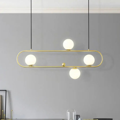 DecorBites modern black gold pendant light with four frosted opal glass globes for dining room ceiling or island lighting
