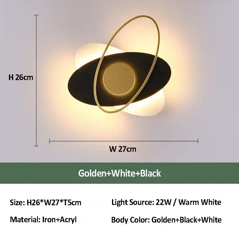 Modern black and gold orbital wall sconce light with sleek iron and acrylic ovals for living room use