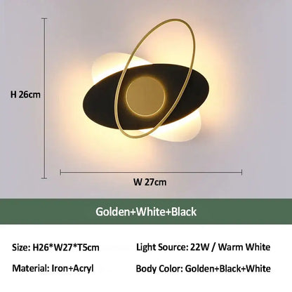 Modern black and gold orbital wall sconce light with sleek iron and acrylic ovals for living room use