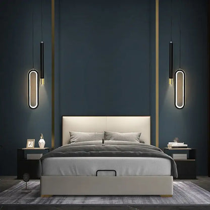 Modern minimalist bed with beige upholstered frame and gold trim under decorbites black pendant lamps for bedroom lighting