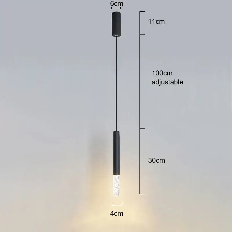 Modern black cylindrical pendant light with frosted glass diffuser and adjustable length for modern interiors light sources
