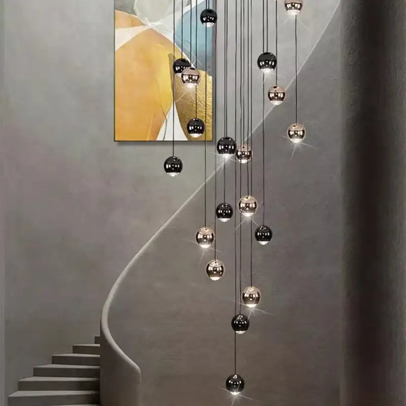 Modern black and gold spherical pendant light with ironware alloy spheres for modern interiors and staircases