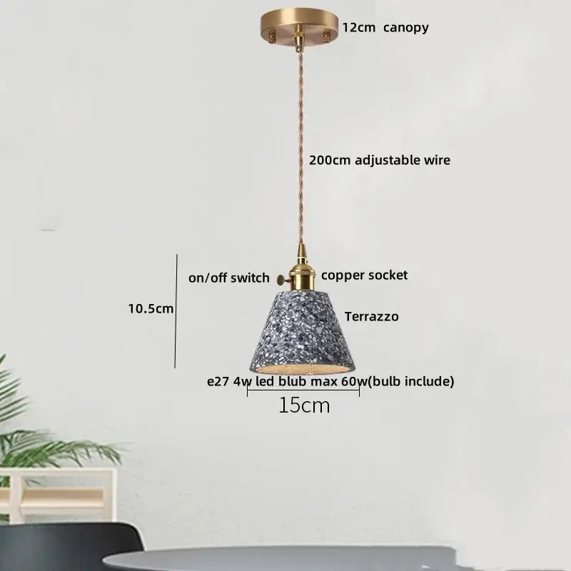 Modern black and gold terrazzo stone pendant lamp with speckled gray white finish brass hardware and adjustable copper wire suspension
