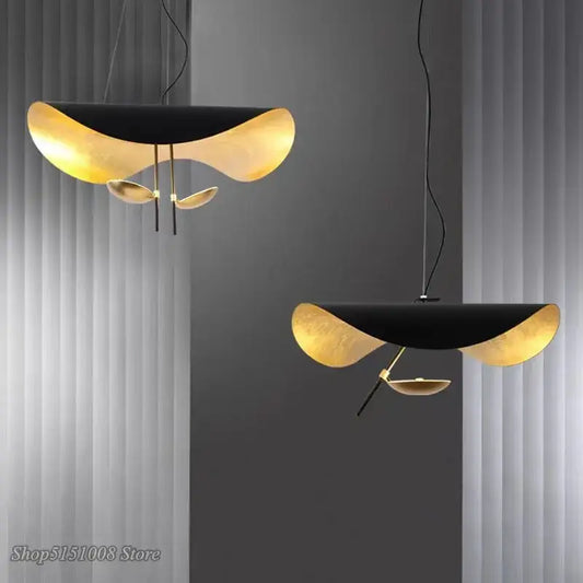 Modern black and gold texture led pendant lights with sleek curved metallic shades for living room decorbites gold texture