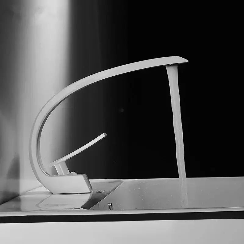 Modern black gold basin faucet with chrome finish sleek curved design and single lever handle by decorbites black gold