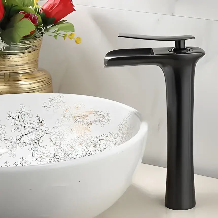 Modern black and gold waterfall basin faucet with sleek matte finish and flat rectangular spout for gold waterfall bathroom decorbites