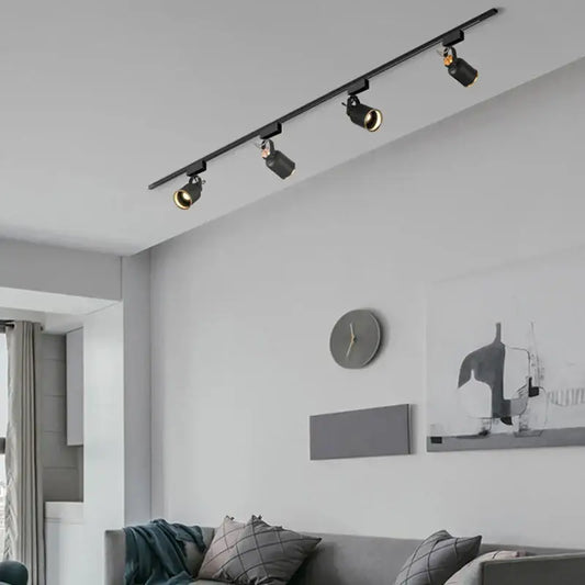 Modern black gu10 7w led track lights with adjustable spotlights on a sleek ceiling rail ideal for kitchen display