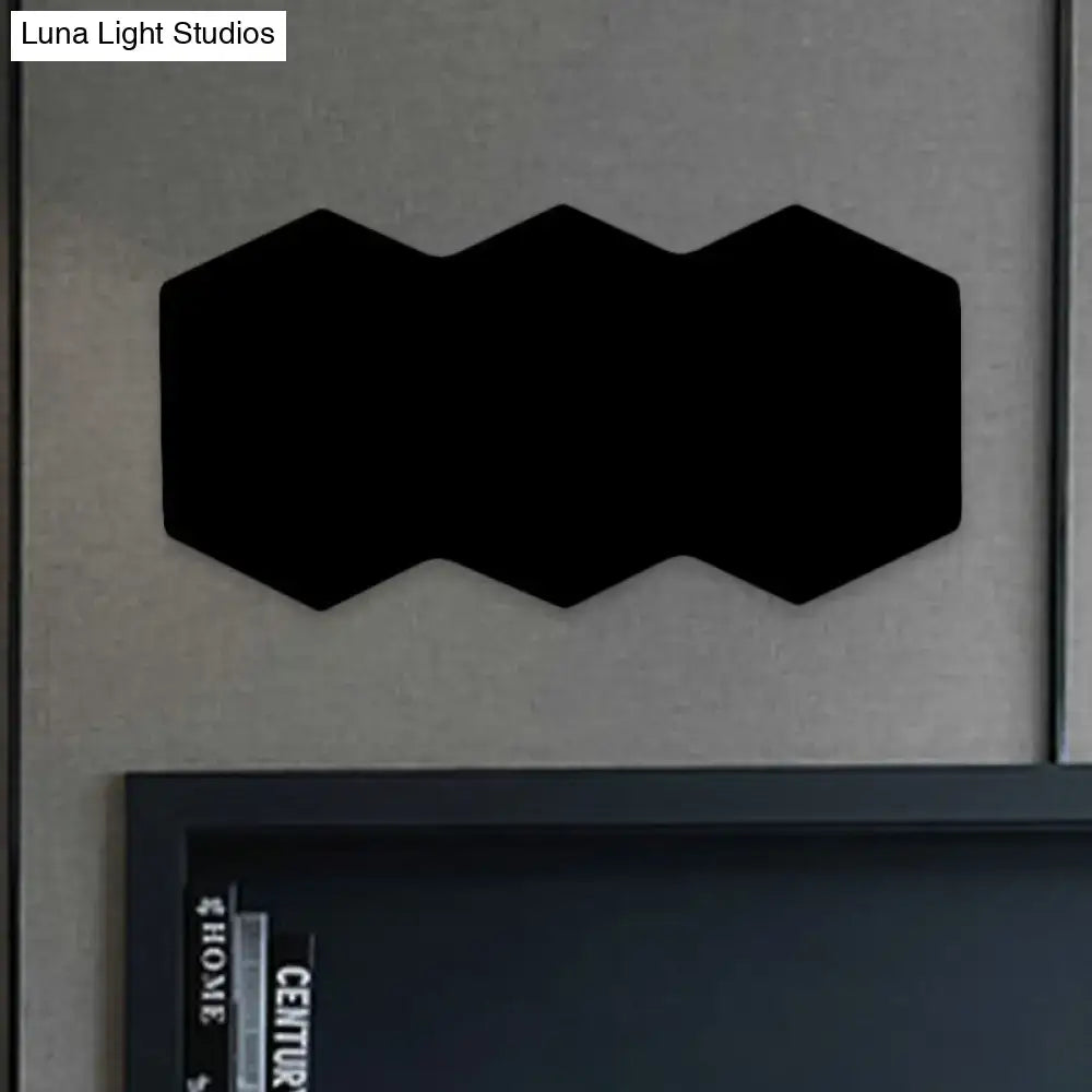 Modern black hexagon aluminum shade wall mount light with sleek design for bedroom decor