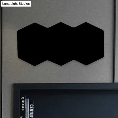 Modern black hexagon aluminum shade wall mount light with sleek design for bedroom decor