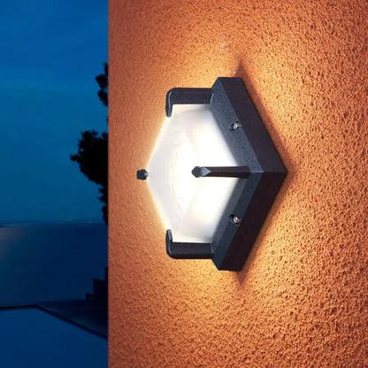 Modern black hexagonal square patio wall light with frosted glass diffuser for stylish outdoor patio wall illumination