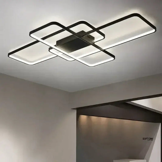Modern black metal decorbites dimmable ceiling light with intersecting rectangular LED panels emitting bright glow