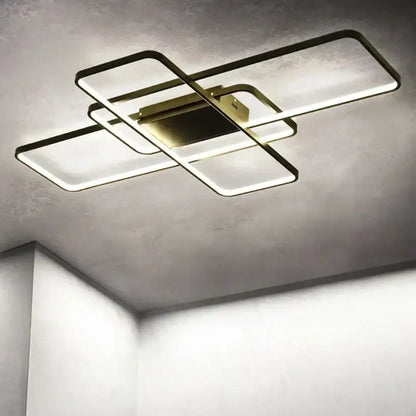Modern black intersecting rectangular decorbites dimmable ceiling light with sleek frame and glowing white illumination