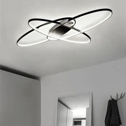 Modern black and white led decorbites dimmable ceiling light with intersecting circular rings for contemporary decor