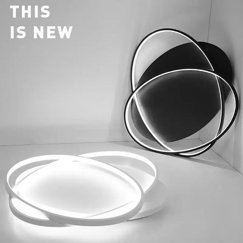 Modern black and white circular led decorbites dimmable ceiling light with sleek overlapping ring design