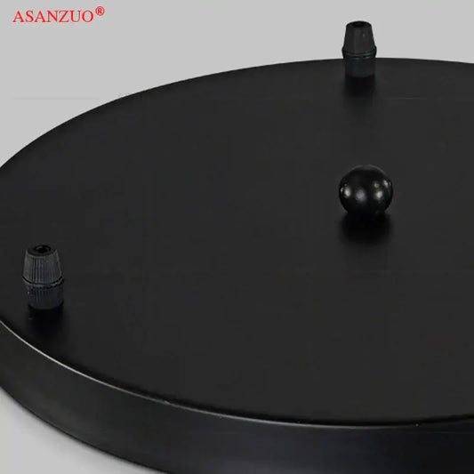 Black circular iron chassis ceiling panel with two caps and central knob for modern dining room decorbites iron chassis light