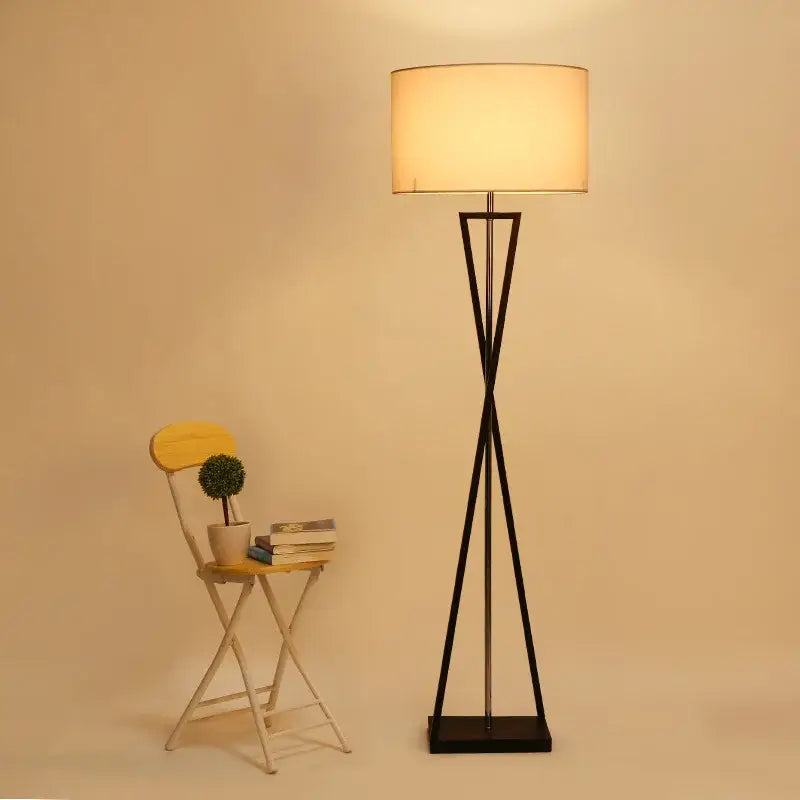 Modern black iron table lamp with off-white fabric shade for bedroom featuring Decorbites iron table design