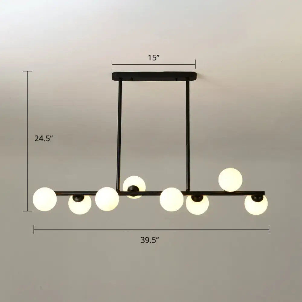Black metal DecorBites Modo Island ceiling light with seven frosted glass globes for elegant dining room lighting