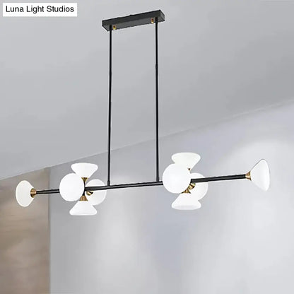 DecorBites contemporary black metal island pendant ceiling light with frosted white glass shades and brass accents
