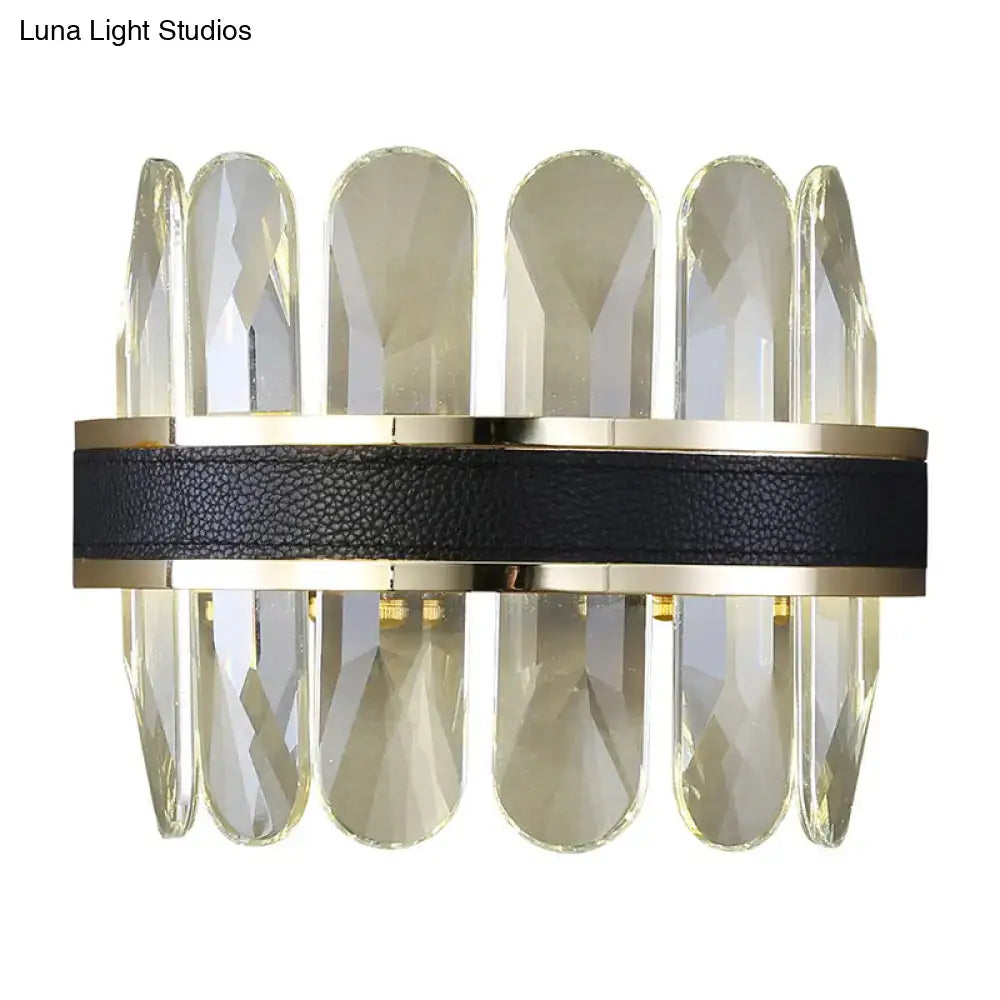 Elegant wall lamp with faceted clear crystal, black leather strap, and polished gold metal for 220v-240v use