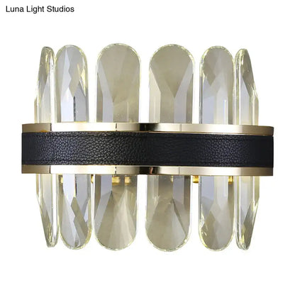 Elegant wall lamp with faceted clear crystal, black leather strap, and polished gold metal for 220v-240v use