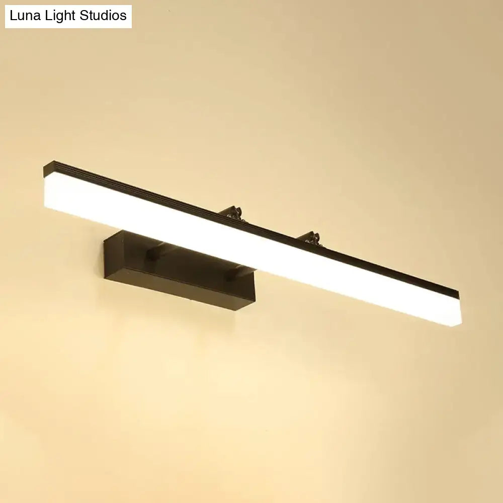 Modern black led bar light with a sleek rectangular minimalist design emitting warm white light for living rooms