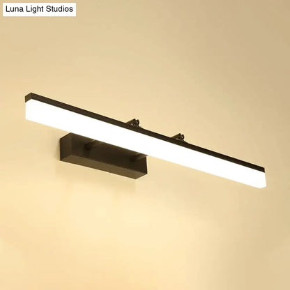 Modern black led bar light with a sleek rectangular minimalist design emitting warm white light for living rooms
