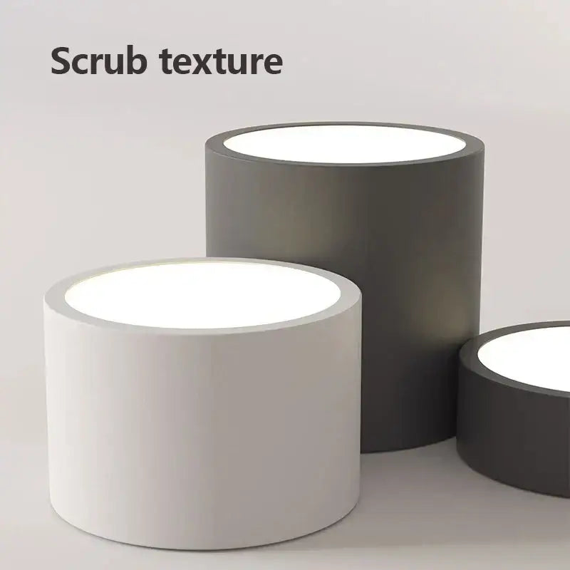 Modern black led ceiling lamp with circular bulbs alongside white and dark gray matte scrub finish cylindrical led floor lamps