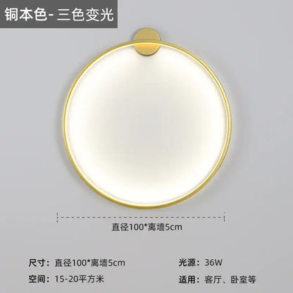 Modern black led wall circle light with gold-toned metallic frame and softly glowing white illumination for living room