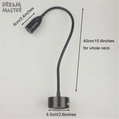 Modern black led wall lamp with adjustable gooseneck and cylindrical base ideal for bedroom reading light