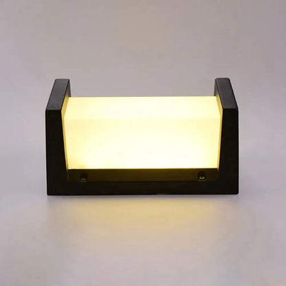 Modern black led wall sconce outdoor light with warm glowing panel and maximum bulb wattage of 10w