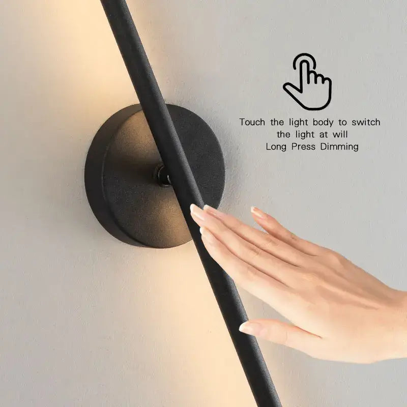 Modern black led wall sconce with cylindrical arm and dimmable touch switch for bedroom lighting