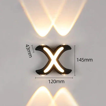 Modern black x-shaped wall lamp with decorbites ip65 led lights casting a warm glow for outdoor use