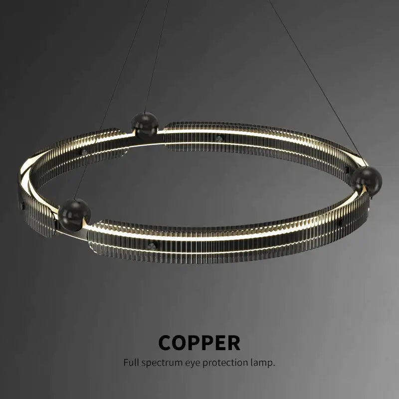 Copper-colored circular pendant lamp with modern ribbed design and embedded led lighting for decorbites light luxury