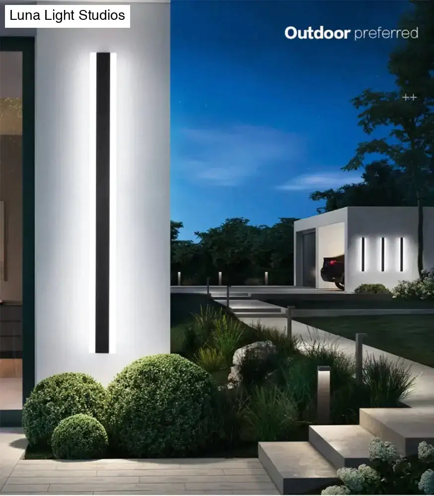 DecorBites™ modern minimalist black and white aluminium led wall sconce emitting bright ambient outdoor light
