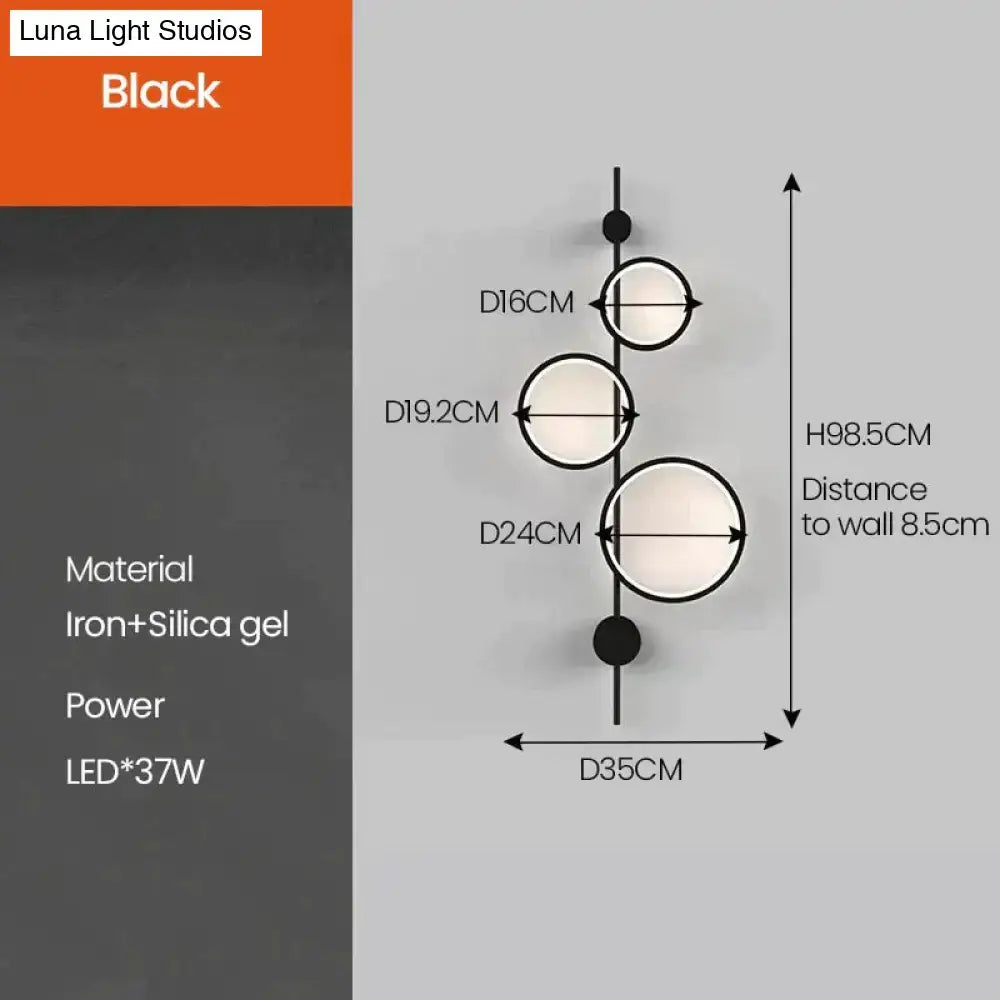 Modern black linear long led wall light by Black luna light studios with three circular iron and silica gel leds